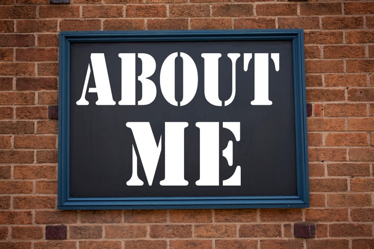 Conceptual hand writing text caption inspiration showing announcement About Me. Business concept for Self Awareness Personal Identity written on frame old brick background with space