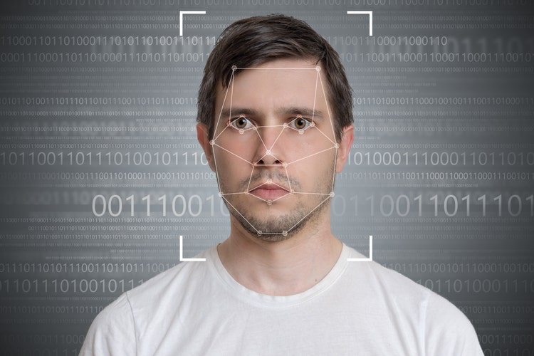 Face detection and recognition of man. Computer vision concept. Binary code in background.